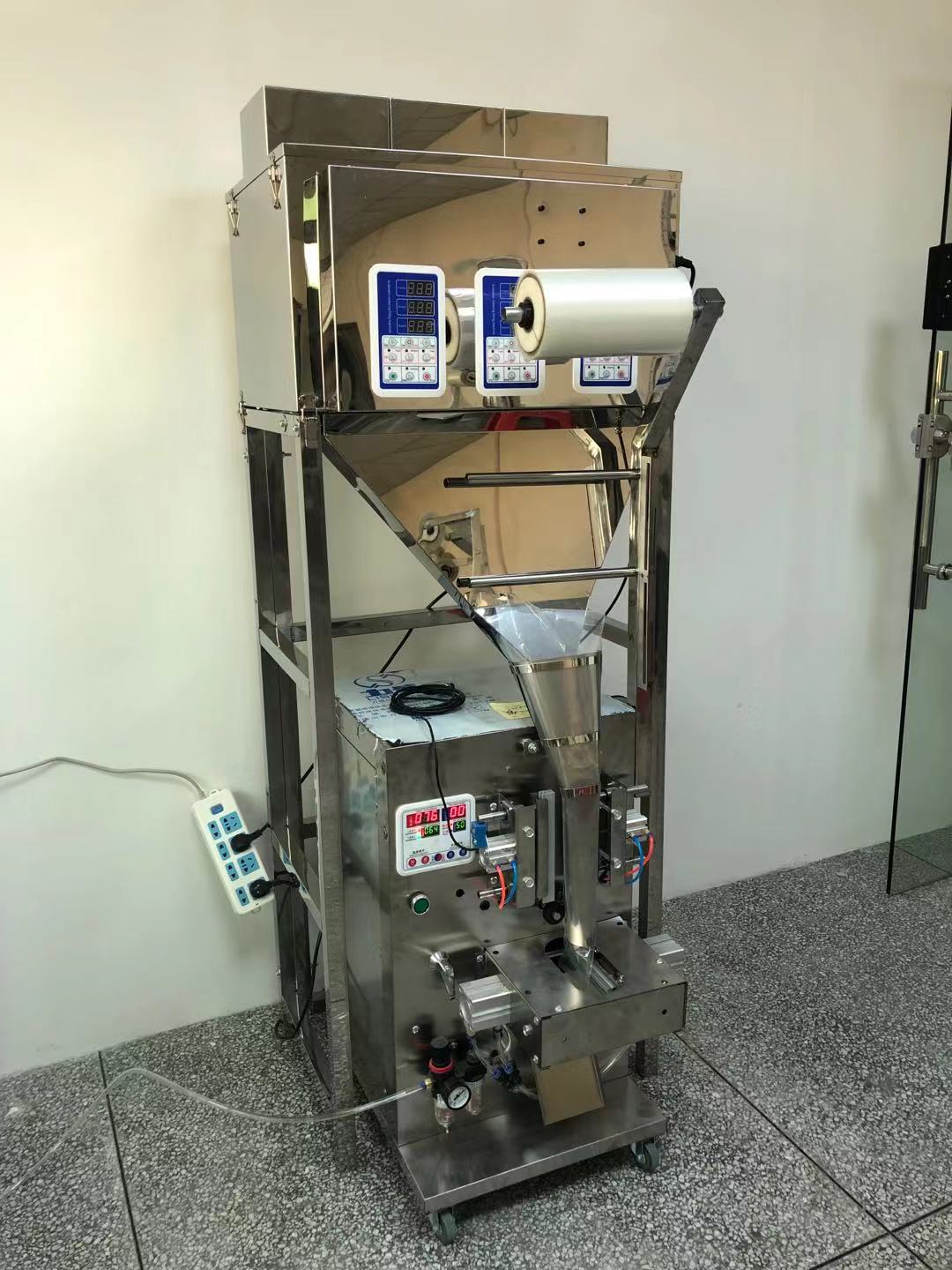 500-1500克中藥材小型顆粒包裝機自動封口